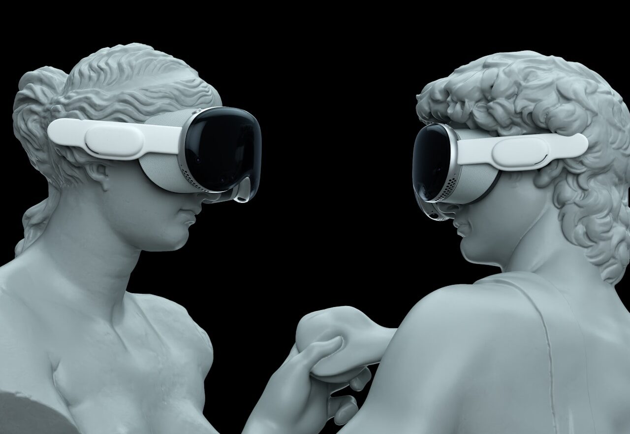 a couple of statues wearing virtual glasses