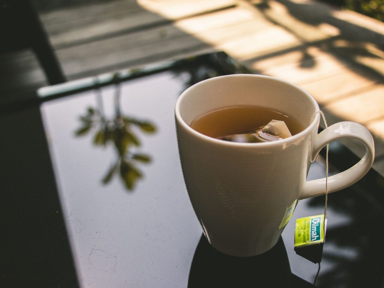 cup of tea on black panel