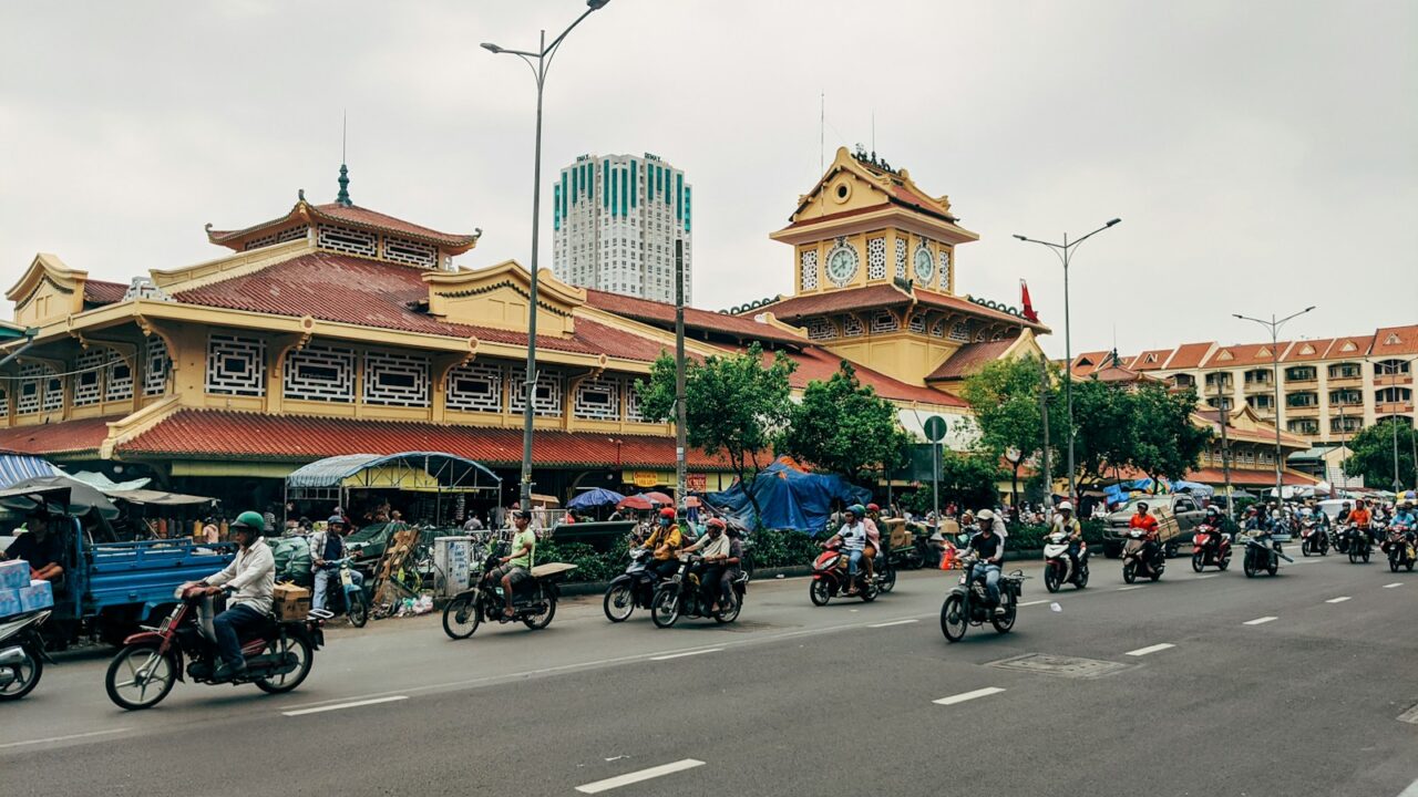 people riding motorcycle on road during daytime